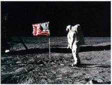 Astronaut on the Moon wth American flag - dpa