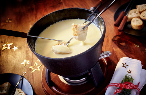 Swiss cheese fondue with Christmas theme