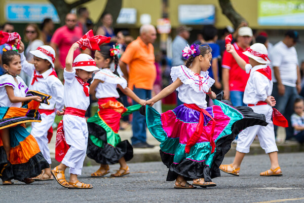 Costa Rican children dancing on Independence Day - image by Wollertz/shutterstock.com