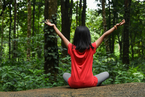 green forest with girl dressed in red