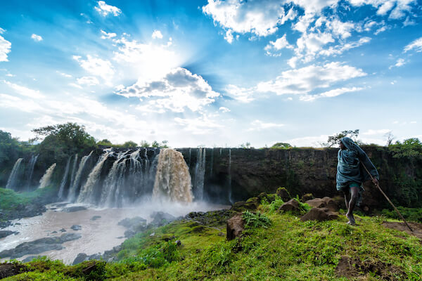 Blue Nile Falls with boy - image by Craig Schuler/shutterstock.com
