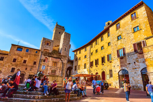 Piazza in San Gimignano in Italy - image by Nataliya Nazarova