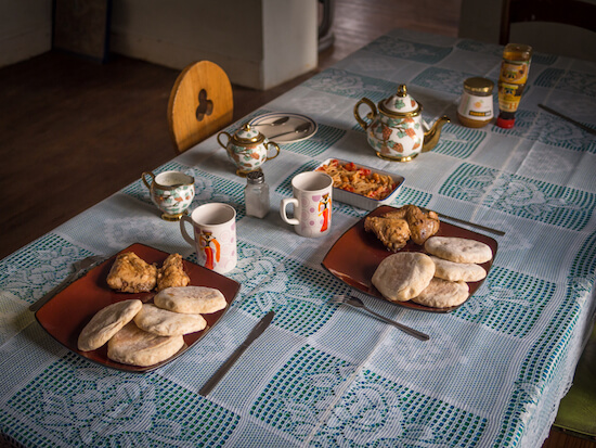 Typical breakfast with Basotho bread, chicken and tea - image by Fabia Plock/shutterstock.com