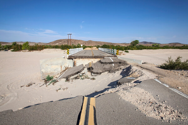 Washed out road after flooding in the Mojave Desert