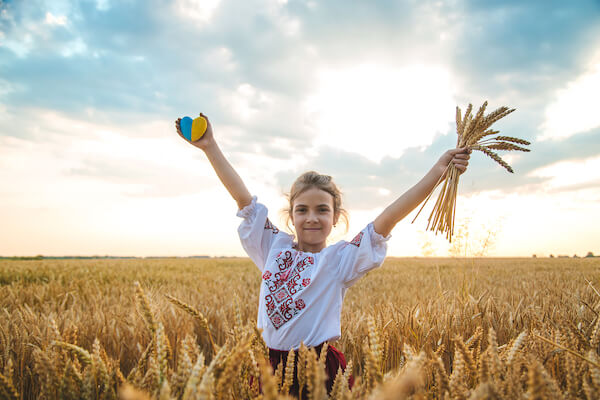 ukraine breadbasket - girl in wheat field