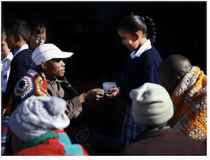 South African children helping feed the poor
