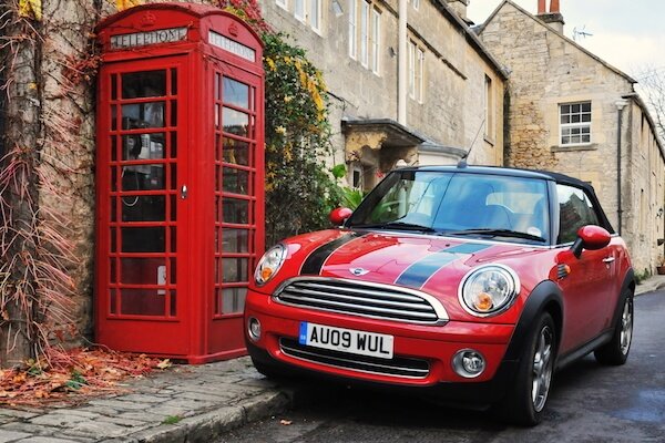 UK symbols: Minicooper and telephone booth - image by 1000Words/shutterstock.com