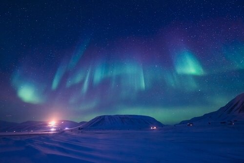 Northern Lights in the Arctic in blue and green