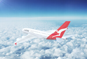 Quantas airplane in the sky - image by Nextnewmedia/shutterstock.com