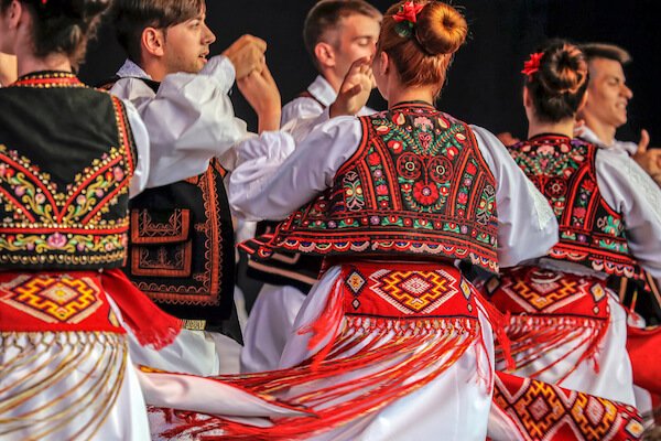 Romanian dancers in traditional costumes - image by Florin Cnejevici