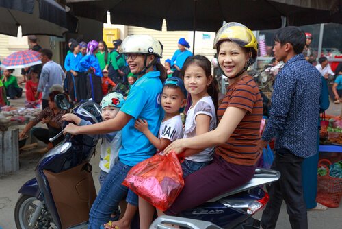 Vietnam family of 5 on a motorbike - image by Quang Nguyen Vinh/Shutterstock.com
