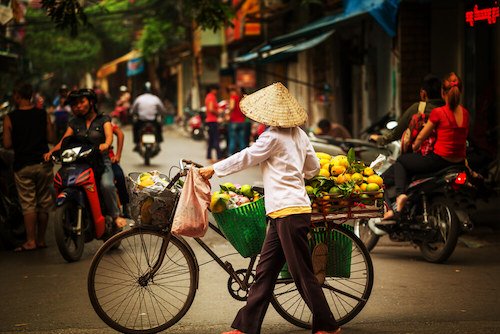 Streetvendor on bike in Vietnam