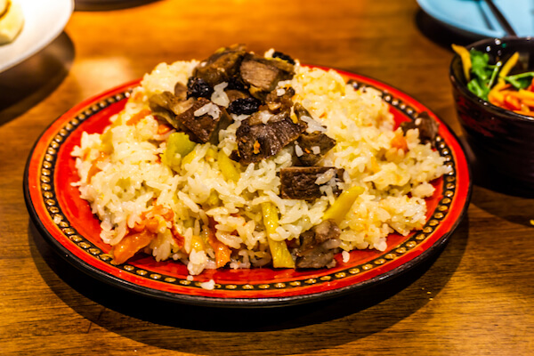 Food in China: Zhua Fan or Xianjian Lamb Rice is a popular Muslim dish.